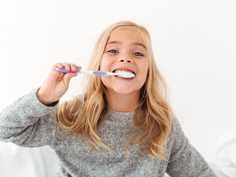 Age of first tooth brushing